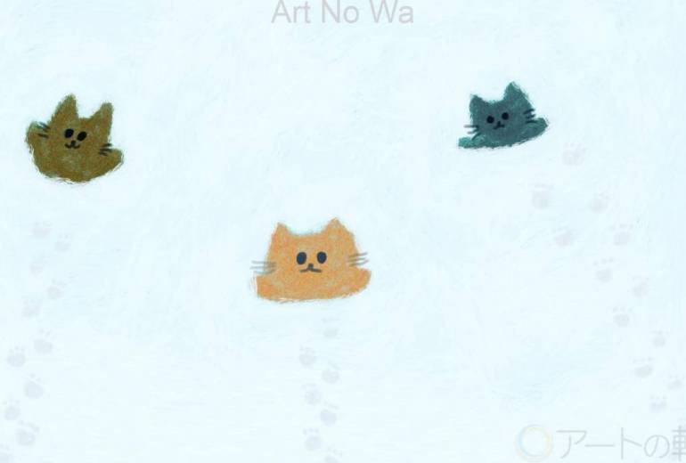 雪に埋もれて遊ぶ猫