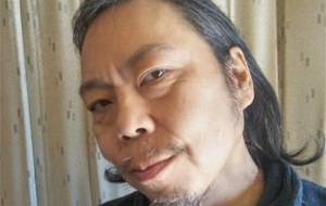 精神病画家の笑顔 - 真鍋哲地