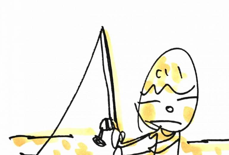 釣りをする少年