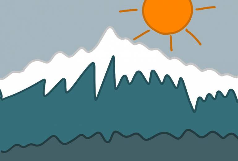 雪解けの山と朝日