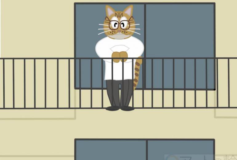 猫がベランダの外を眺めている