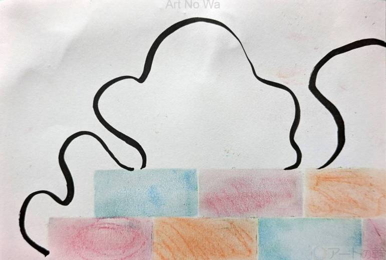 ブロック塀から見た入道雲