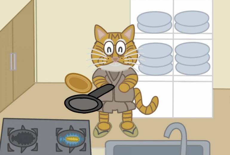 茶トラ猫がホットケーキを作っている所
