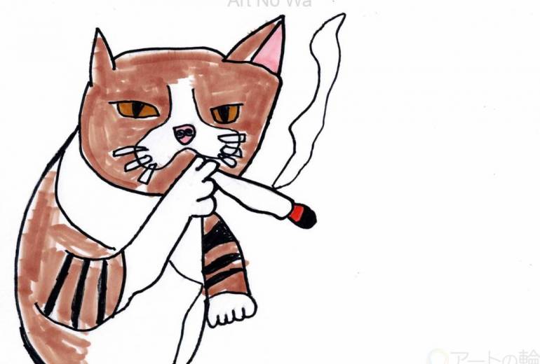 ねこがタバコを吸ってる